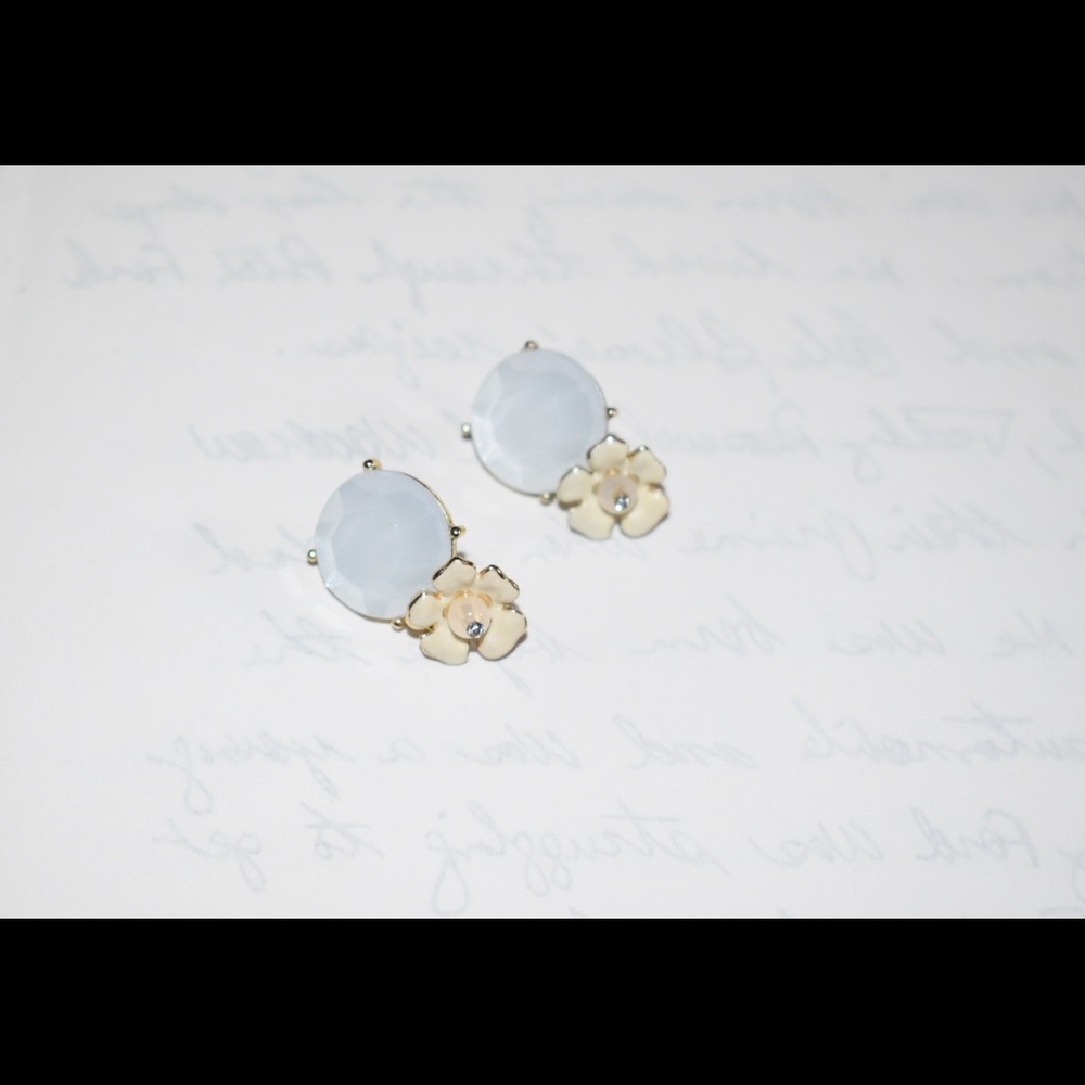 White and gold statement earrings